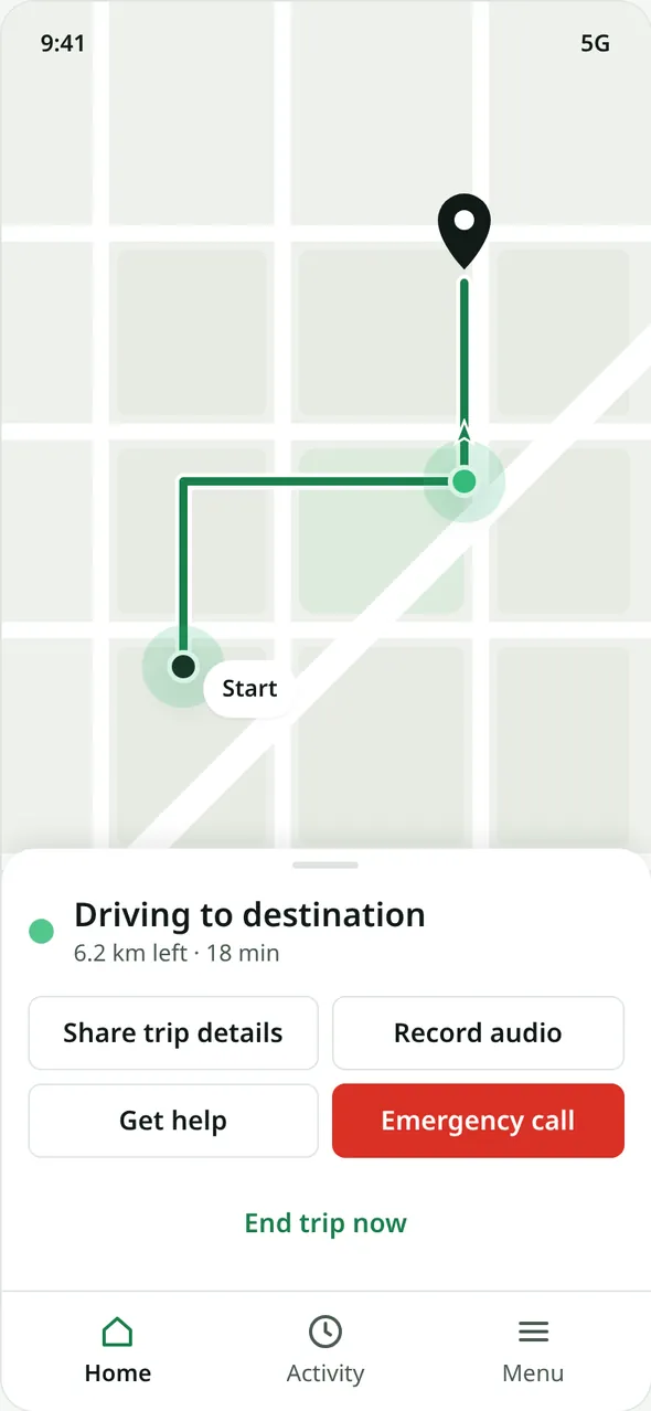 Trip ongoing: map with route, 'Driving to destination', Share trip details, Record audio, Get help, a red Emergency call button and End trip now.